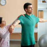 Home physiotherapy in Crossings Republik — Corefit Physiocare therapist treating patient at home Home physiotherapy in Crossings Republik — Corefit Physiocare therapist treating patient at home