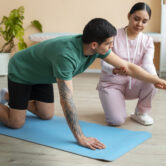 Physiotherapy in Vasundhara — Corefit Physiocare specialist treating a patient Physiotherapy in Vasundhara — Corefit Physiocare specialist treating a patient