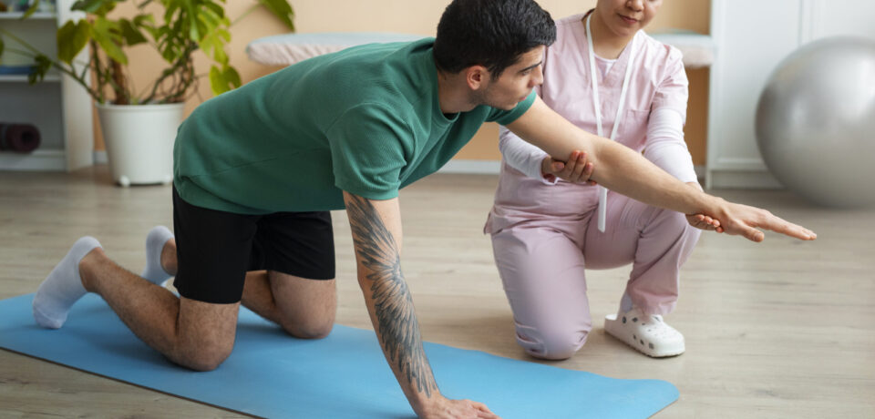 Physiotherapy in Vasundhara — Corefit Physiocare specialist treating a patient Physiotherapy in Vasundhara — Corefit Physiocare specialist treating a patient