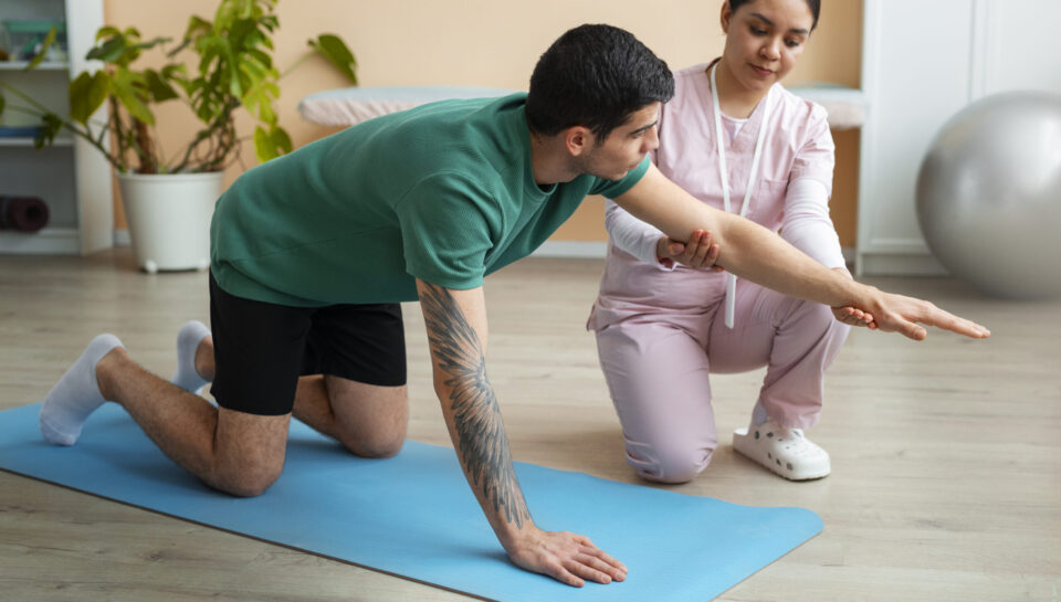 Physiotherapy in Vasundhara — Corefit Physiocare specialist treating a patient
